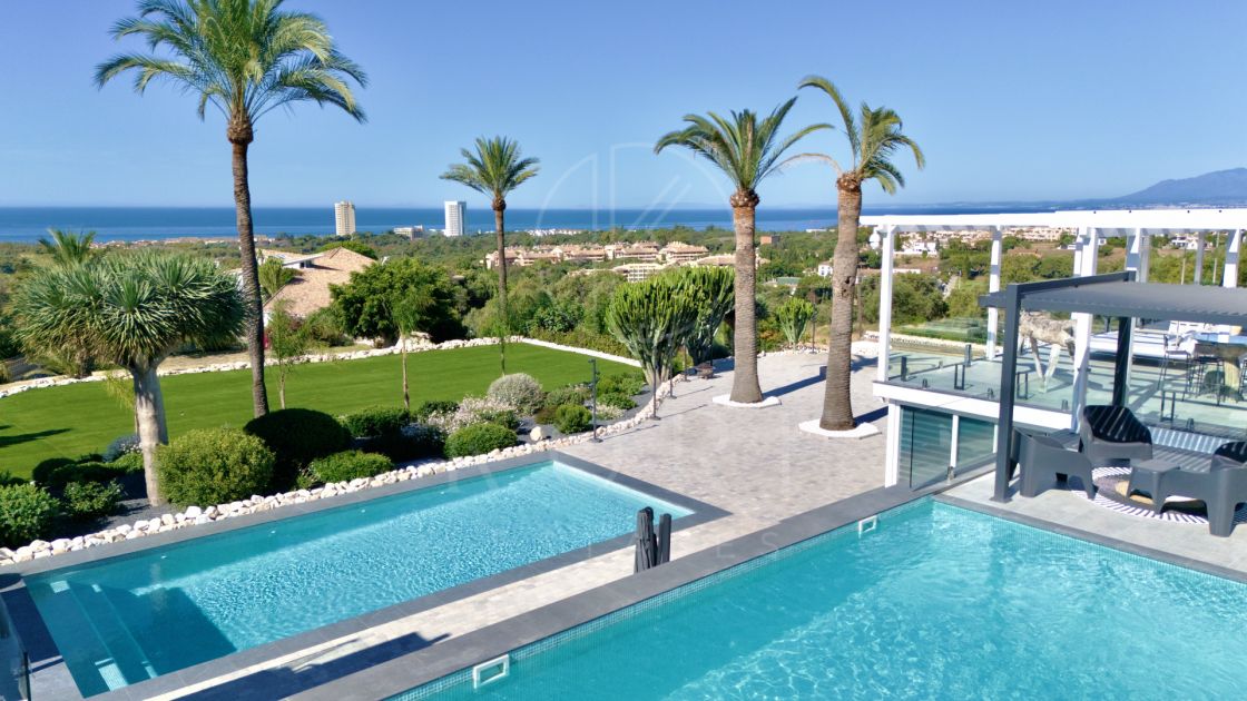 Luxury sea-view villa with development potential for sale in Elviria, Marbella East