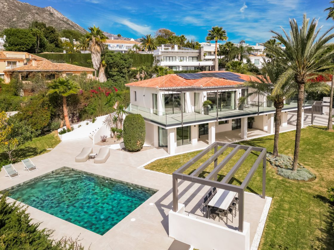 African View - Set in Nagüeles, moments from Marbella’s Golden Mile, this villa offers open views to the Mediterranean