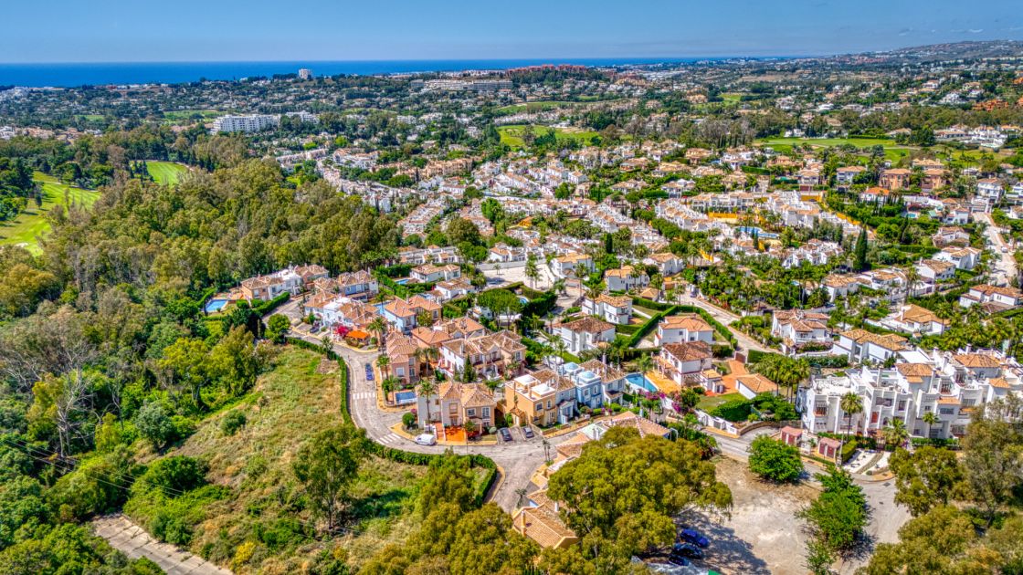 Elegant two bedroom, south west facing townhouse set within an exclusive gated community of Nueva Andalucia, Marbella