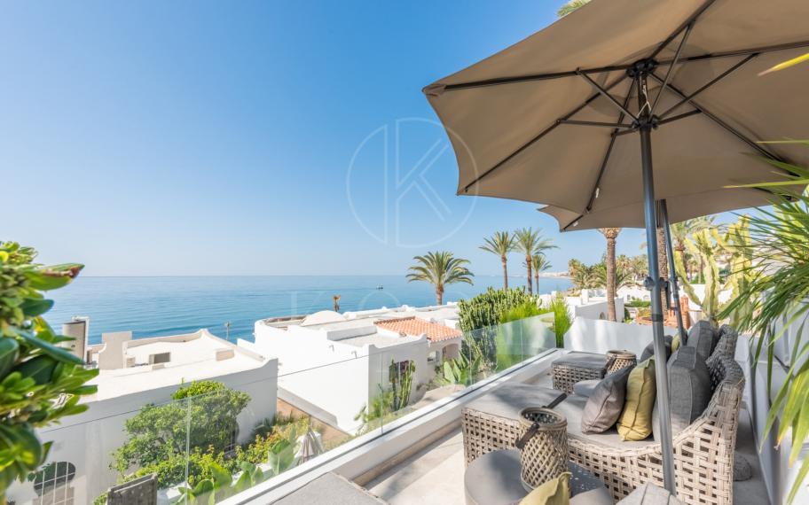 Scandi-style design bungalow in the beachfront Oasis Club on Marbella's Golden Mile.