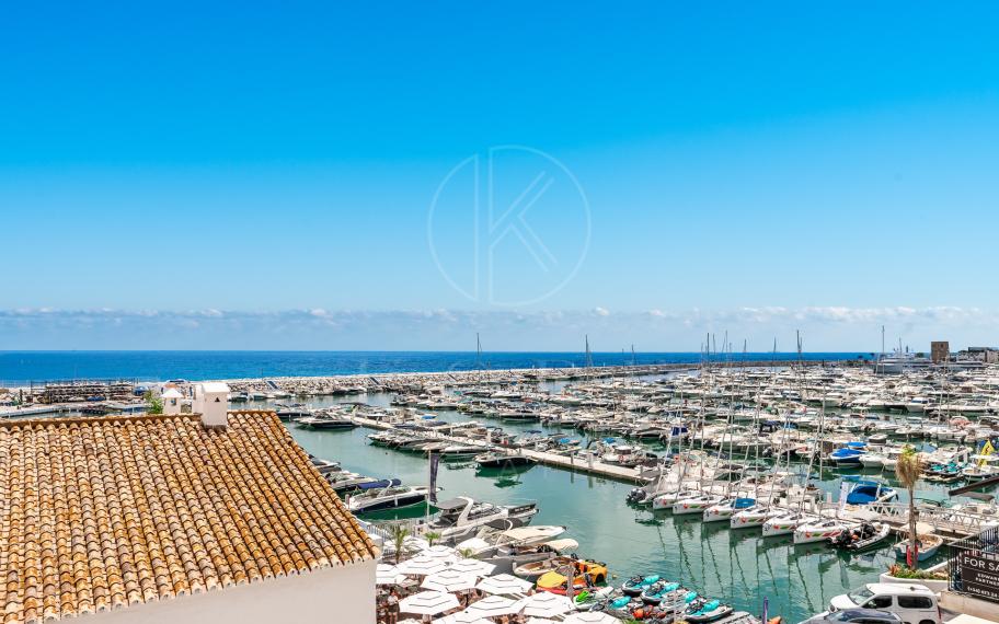 A luxurious and  contemporary designed apartment located within the the famous marina of Puerto Banus