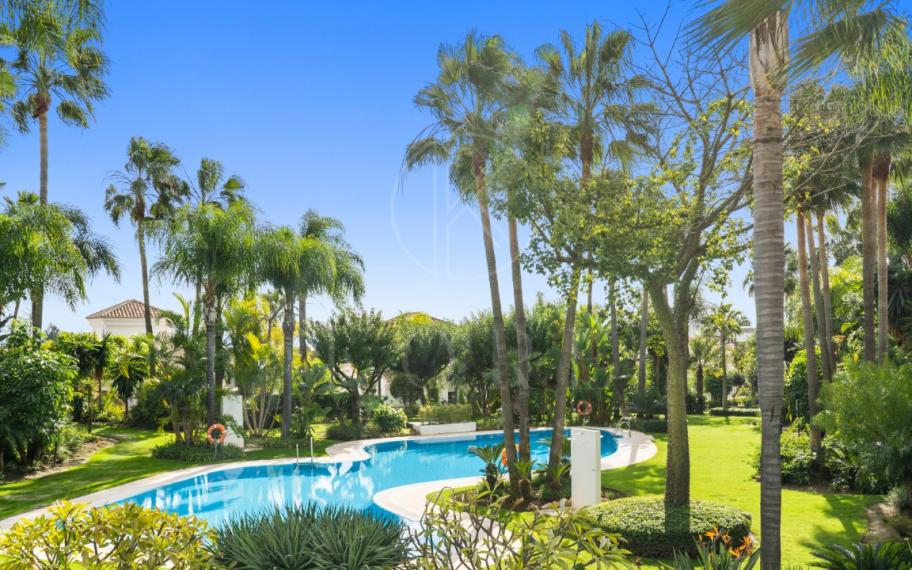 Magnificent five-bedroom, south-facing villa situated in the prestigious Village Las Lomas de Magna Marbella with sea views