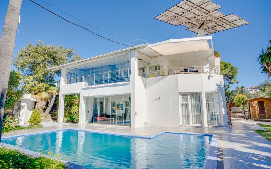 Unique eight bedroom south facing villa, in a tranquil area of Elviria, Marbella boasting sea views