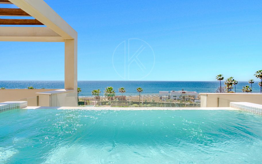 Luxurious south-facing four-bedroom duplex penthouse, frontline beach, located in a beachfront community on Marbella’s prestigious New Golden Mile with sea views.
