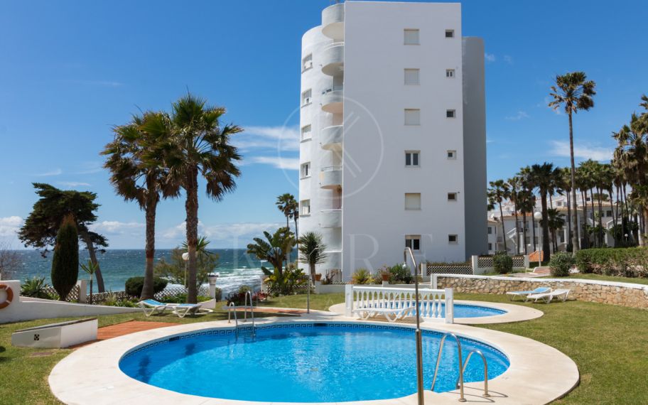 This exclusive 4th-floor apartment is a true coastal sanctuary, offering uninterrupted sea views and direct access to pristine beaches and lush communal gardens.